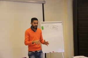 TG1 participant Zeid Alhaji presents his experience to the upcoming TG2 participants before their experience starting in April 2015
